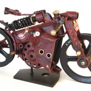 <strong>"THE RED RACER" </strong>Components: reanimated objects / Size: 57 cm x 36 cm