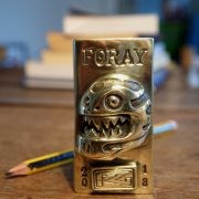 Handcrafted brass emblem for the FORAY.